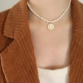 Minimalist pearl necklace with a gold-rimmed white shell letter U initial pendant - Letter U