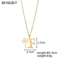 Detail view of 18K gold plated stainless steel letter F pendant with face and floral motifs - Letter F Style (BX1662B-F)