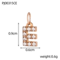 Macro shot of rose gold letter E pendant with dimensions showing 0.9cm height and 0.6g weight - Letter E