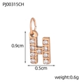 Macro detail of rose gold letter H pendant with pavé cubic zirconia measuring 0.9x0.5cm - Letter H