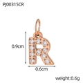 Detail of rose gold letter R pendant with white zircon pavé and dimensions 0.9x0.6cm - Letter R