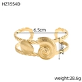 Macro shot of gold stainless steel bangle with seashell and conch motifs and dimensions - Twisted Rope Woven Conch Shell Style (HZ1554D)