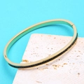 18K vergoldetes Edelstahl-Armband mit Scharnier und lebhaften schwarzen Zirkon-Details - Zahl 4 / Gold + Schwarzer Zirkonia