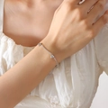 Minimalistische zilveren hartarmband met drie gladde hartbedels aan een fijne ketting - Stalen Horizontale Hart Armband-15+5cm