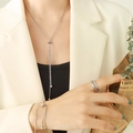 Set tre pezzi argento con collana a Y, bracciale e anello in finitura lucida - Collana / Colore acciaio