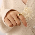 French style gold ring set with green zircon gemstone and open gold band on hand - US 7 / Gold