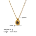 Detailed view of black zircon pendant size 59mm by 5mm on gold chain necklace - Vintage Black Gemstone Pendant Necklace (X2346)