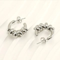 Boucles d'oreilles créoles torsadées en argent avec un design en spirale unique - Or 18 carats / Acier