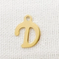 Close-up of golden letter D pendant with polished finish for DIY jewelry necklaces - Letter D