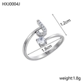 Bague ouverte en argent avec note de musique en zircon et cristaux pavés sur l'anneau - Lettre J / Acier