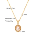 Detail of vintage gold necklace featuring a pearl pendant surrounded by small crystals - Gold Style (HF-X2477-G)