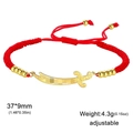 Adjustable red cord bracelet featuring a gold sword pendant and polished metal beads - Bracelet - Gold - Red String