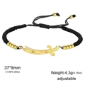 Adjustable black braided bracelet with golden sword pendant and textured carving details - Bracelet - Gold - Black Cord