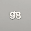 Macro detail of polished stainless steel number 98 pendant with mirror finish and bail - Number 98 / Steel