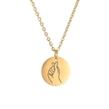 Detailed view of a golden circular pendant with a modern laser-engraved finger heart gesture - Gold Color-Finger Heart
