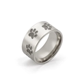 Close-up of a 10mm wide stainless steel ring featuring engraved animal paw print designs - US 7 / Steel