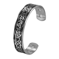 Detail of Celtic knot relief and magnetic therapy stones on vintage steel bangle - Magnetic Triskelion (Style 15)