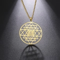 Detailed view of Sri Yantra gold pendant necklace with geometric triangle pattern - Gold