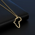 Polished gold African map pendant necklace displayed on black leather background - Gold
