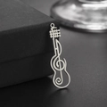 Polished stainless steel guitar pendant with musical treble clef cutout design - Steel