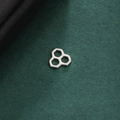 Macro shot of minimalist stainless steel honeycomb pendants on a dark green background - Honeycomb Shape - Steel Color