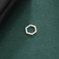 Macro view of mirror polished stainless steel hexagon pendant on a dark textured surface - Style 8-Steel Color