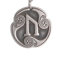 Macro detail of antique silver Viking rune pendant with Celtic scrollwork design - Uruz Rune (Style 2)