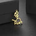 Polished gold stainless steel RUN runner pendant on a textured black background - Gold Running RUN Fusion (Style 8)