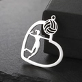 Polished heart-shaped volleyball pendant with female athlete silhouette on black stone - Steel