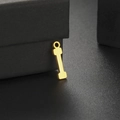 Macro view of a polished gold letter I pendant featuring a mirror finish on a jewelry box - Gold Letter I Style (Style 4)