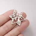 Macro detail of silver stainless steel hexagram pendant with intricate tree of life design - Hexagon Tree Of Life - Steel Color