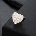 Macro detail of heart-shaped stainless steel charm featuring Hope engraving and floral patterns - Hope Style (SS2024052227-34) / Hope-Steel Color