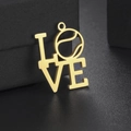 Detail of a gold LOVE pendant featuring a tennis ball O on black velvet display - Tennis Pattern Style (Style 1-Gold)