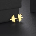 Macro detail of golden dumbbell pendant for fitness necklace on black matte background - Gold Fitness Dumbbell (Style 5)