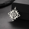 Silver stainless steel Celtic knot pendant with moon and starburst design details - Steel