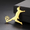 Macro shot of 18K gold plated soccer player pendant on a premium black jewelry box - Powerful Kick Style (Style 4) / Gold