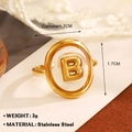 Puffy golden stainless steel letter B ring featuring a polished oval signet and 3g weight - Letter B