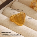 Golden heart-shaped stainless steel ring with elegant 3D vertical stripe texture - Striped Heart Texture (1025) - Gold