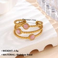 Gold-plated stainless steel triple-layered ring featuring three round pink stone accents - Pink