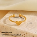 18K gold plated heart ring in stainless steel with textured relief and twisted band - Grainy Heart Texture Gold Ring (1263)