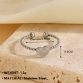 Silver stainless steel heart ring with twisted rope band and adjustable open design - Grainy Heart Texture Steel Ring (1263)