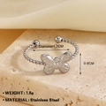 Silver 18K plated stainless steel twisted ring featuring a 3D butterfly centerpiece - Hollow Butterfly Steel Ring (1265)