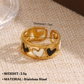 Golden stainless steel open ring with black and white enamel heart-shaped pattern - Black White Hollow Heart Style (1338)