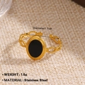 Adjustable golden stainless steel ring featuring a black oval stone and woven band - Vintage Black Oval Style (1419)