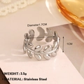Anello aperto con motivo a foglie in acciaio argento da 1,7 cm e finitura a specchio - Stile Foglia d'Ulivo (1194) / Colore acciaio