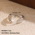 Minimalist silver wavy stainless steel ring with 1.7cm diameter on woven background - 1322 Streamlined Style / Silver