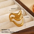 Three-layer gold wave ring in stainless steel for women displayed in a jewelry box - Gold (1554)
