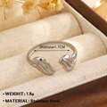 Adjustable silver finish stainless steel ring with wave patterns in a jewelry box - Leaf Feather (1583) / Steel