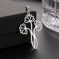 Macro shot of silver cutout triple lotus flower pendant on black jewelry box - Steel