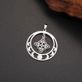 Silver Celtic witch knot pendant with moon phase design on black textured background - Steel